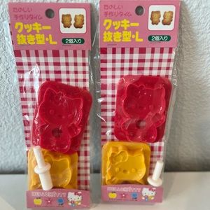 New in plastic. 2 sets of Hello Kitty molds